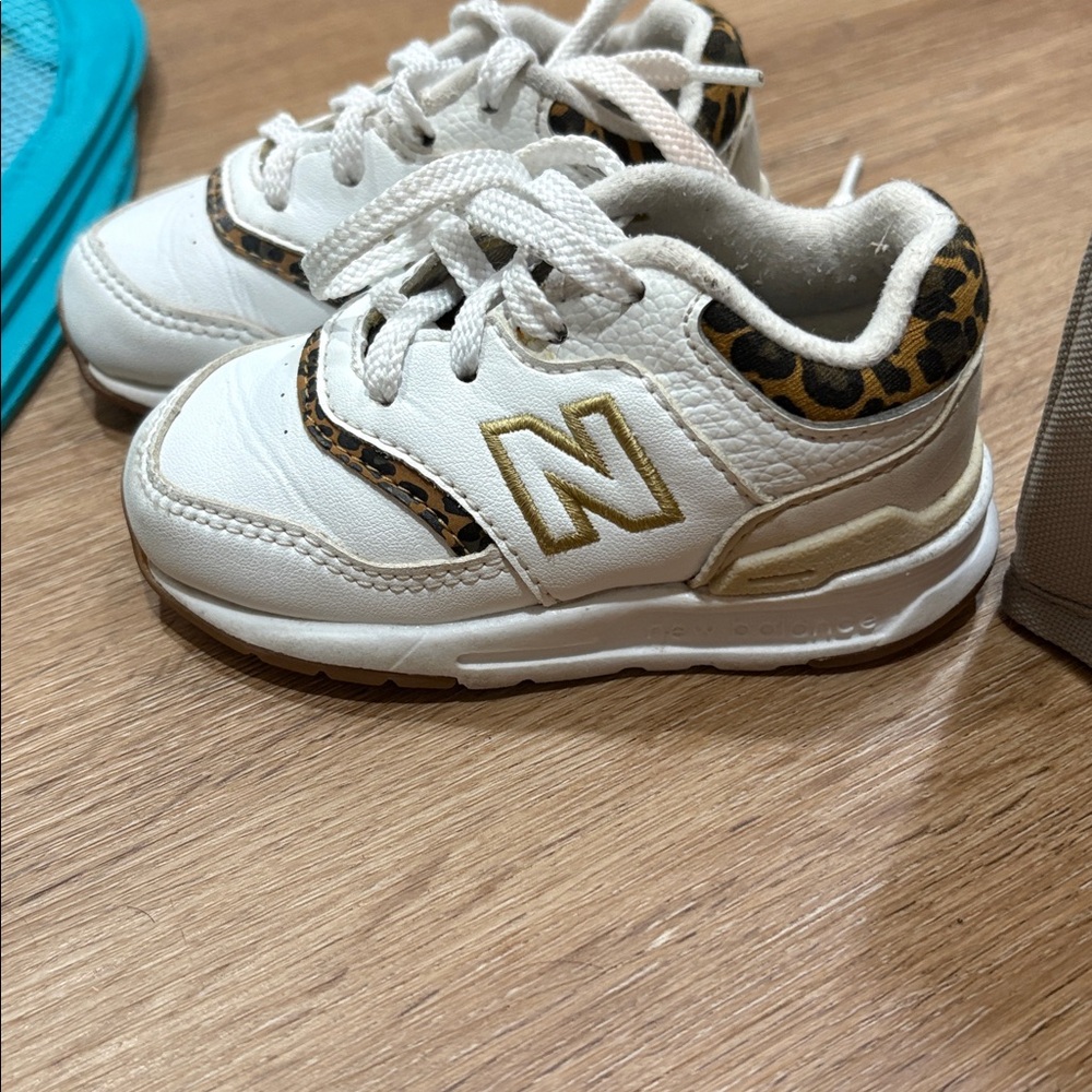 New Balance Kids White and Gold Sneakers with Leopard Accents